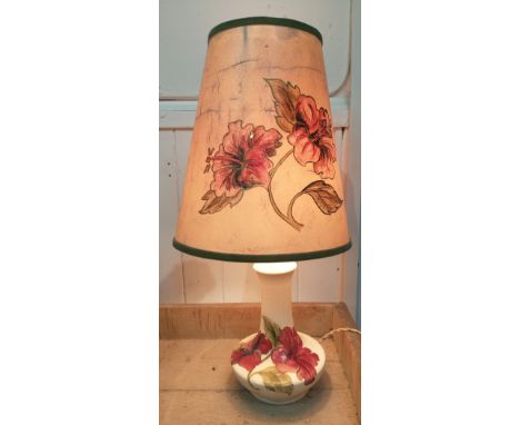 A vintage MOORCROFT table lamp with red hibiscus approx 20cm high, with original lamp shadeApprox 1 pieces