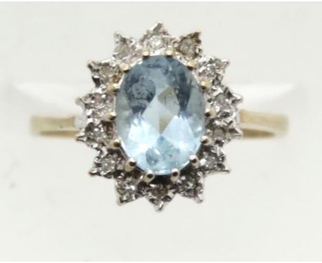 9ct gold blue topaz and diamond cluster ring, size K, 2.0g. P&amp;P Group 1 (£14+VAT for the first lot and £1+VAT for subsequ