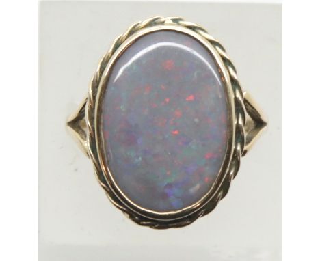 9ct gold large opal set D ring with rope edge setting, opal H: 20 mm, size L/M, 5.9g. P&amp;P Group 1 (£14+VAT for the first 