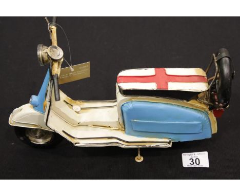 Tinplate blue and white model scooter. P&amp;P Group 2 (£18+VAT for the first lot and £2+VAT for subsequent lots) 