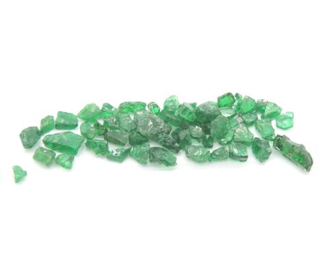 Loose gemstones: Quantity of rare rough Kenyan green garnets.  P&P Group 1 (£14+VAT for the first lot and £1+VAT for subseque