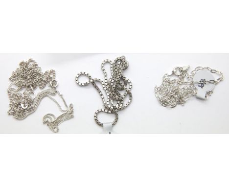 Two silver curb link necklaces L: 46 cm, diamond cut silver fine chain L: 46 cm and a silver box link necklace chain L: 40 cm