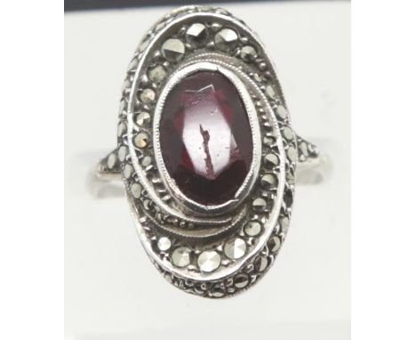 935 silver oval marcasite and red stone set ring, size N. P&amp;P Group 1 (£14+VAT for the first lot and £1+VAT for subsequen