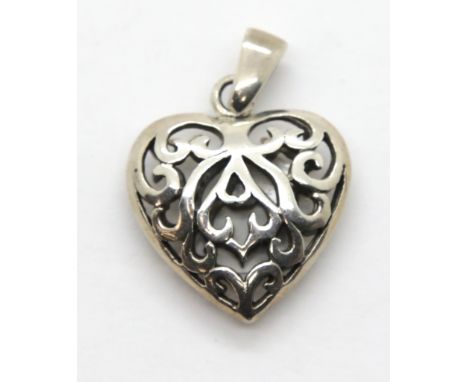 Vintage silver filigree heart shaped pendant. P&amp;P Group 1 (£14+VAT for the first lot and £1+VAT for subsequent lots) 