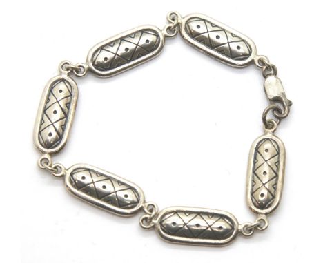 Sterling silver solid fancy bracelet, hallmarked. P&amp;P Group 1 (£14+VAT for the first lot and £1+VAT for subsequent lots) 