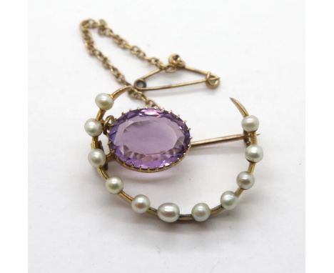 Victorian (presumed gold) ladies seed pearl and amethyst crescent brooch with safety chain. P&amp;P Group 1 (£14+VAT for the 