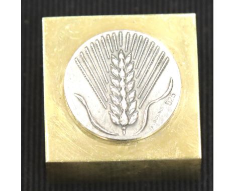 Sterling silver mounted square brass paperweight, relief design showing a wheat sheaf and stamped 925, W: 40 mm x D: 40 mm x 
