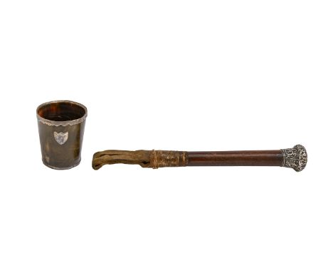 A George III silver mounted horn beaker, 71mm h, unmarked and the handle of a Victorian whip with silver pommel (2) Both worn
