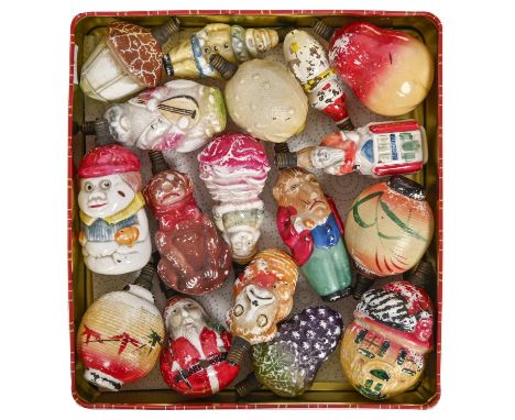 Seventeen moulded and painted glass Christmas tree lights, 1930s, in the form of Father Christmas and other figures, Chinese 