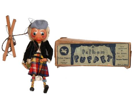 Vintage toys. A Pelham puppet, "Sandy Macboozle", in original cardboard box with instructions Good condition
