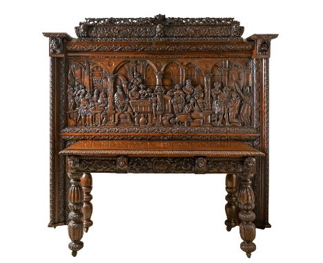 An extraordinary Victorian oak antiquarian taste buffet table, incorporating an overmantle and earlier elements,&nbsp; the pa