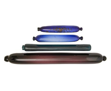 Four Victorian blue, green and purple glass rolling pins, the smallest inscribed Remember Me, 76cm l and smaller Some wear to