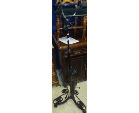 A black painted wrought metal oil lamp stand (without oil lamp)