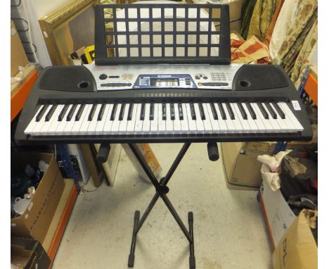 A Yamaha EZ-150 keyboard and stand, a folding metal framed workbench and a brassed table lamp base of columnar form (3)