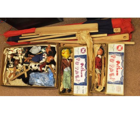 A collection of nine Pelham and other puppets, to include Mr Turnip (boxed), Simple Dancing Puppet (boxed), witch, school gir