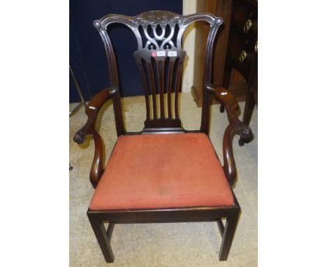 A 19th Century mahogany elbow chair with drop-in seat