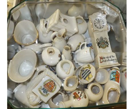 A tin containing a collection of Goss and other crested, together with a box containing a collection of crested china and a s