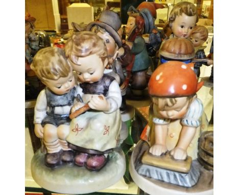 A collection of nine Goebel Hummel figures to include "The smart little sister", "Begging his share", "For mother", "Big hous