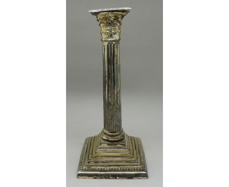 A silver candlestick, Birmingham 1899, height 24cm