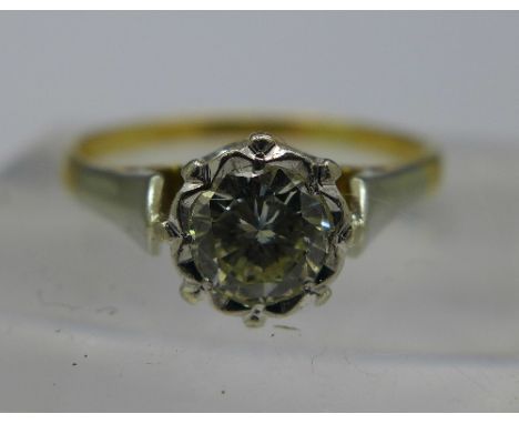 An 18ct gold, platinum set diamond solitaire ring, weight 2.1g, size M