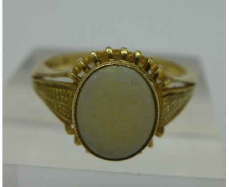 A 9ct gold and opal ring, weight 3.0g, size S