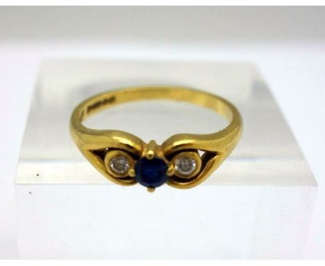 An 18ct gold, sapphire and diamond ring, weight 3.1g, size M