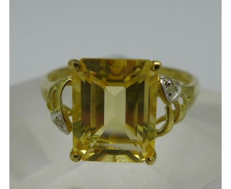 A 9ct gold, citrine and diamond ring, weight 1.8g, size O