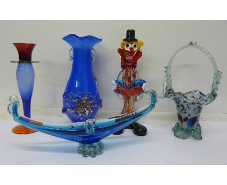 Five items of coloured glass including clown and candlestick