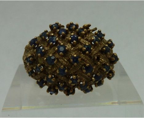 A 9ct gold and sapphire ring, weight 7.3g, size O, lacking one stone