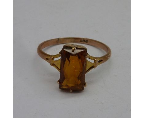 A 9ct gold and orange stone ring, weight 2.1g, size R