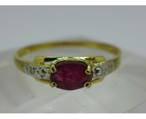 A 9ct gold, ruby and diamond ring, weight 0.8g, size O