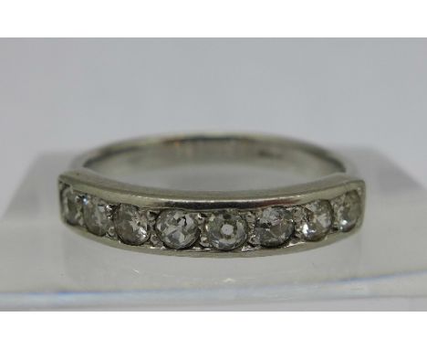 A platinum set, eight stone diamond ring, weight 5g, size N