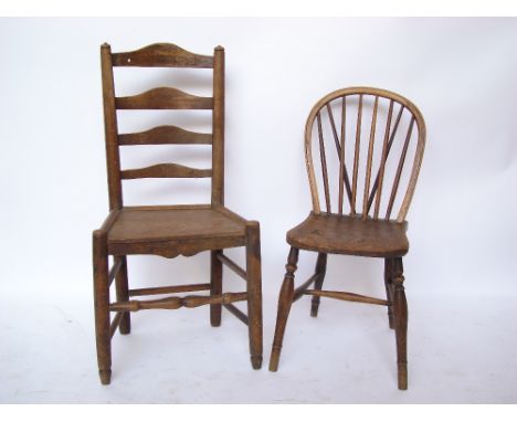 A 19th Century ash and oak ladderback chair with solid seat and a 19th Century beech and yew stick chair with burr elm seat. 