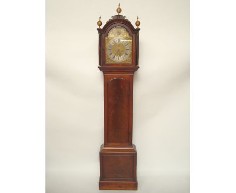 An early 18th Century mahogany longcase clock, the 12" arched dial with silvered chapter ring, Roman numerals, subsidiary sec