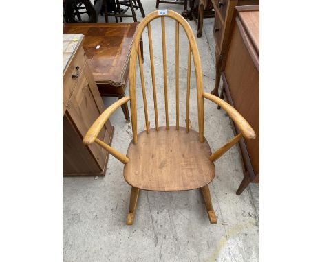 AN ERCOL ELM SEATED ARCH BACK CHILDS ROCKING CHAIR 