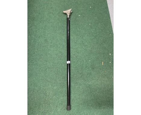 A DARK WOODEN WALKING STICK WITH A SILVER PLATE WOLF'S HEAD HANDLE 