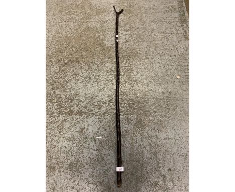 A THUMB WOODEN WALKING STICK 