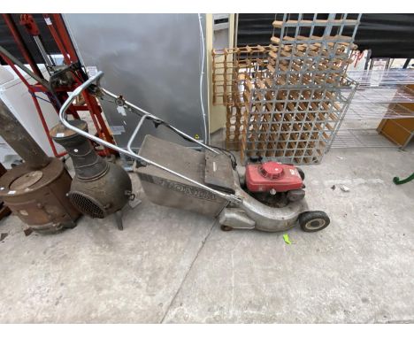 A HONDA HR216 PETROL ROTARY MOWER 