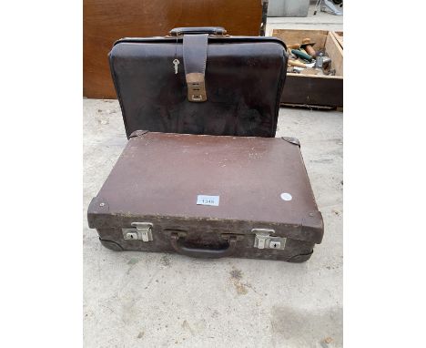 A SMALL VINTAGE SUITCASE AND A VINTAGE BRIEF CASE 