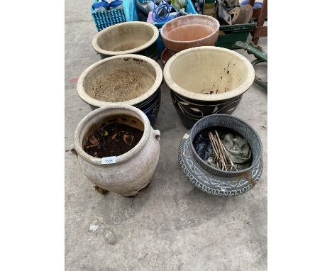 A BRONZE PLANTER AND FIVE STONEWARE PLANTERS 