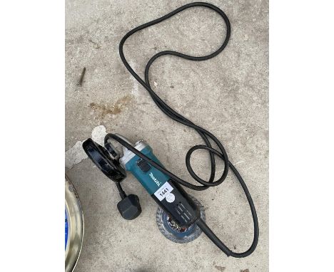 A MAKITA ANGLE GRINDER - IN W/O 