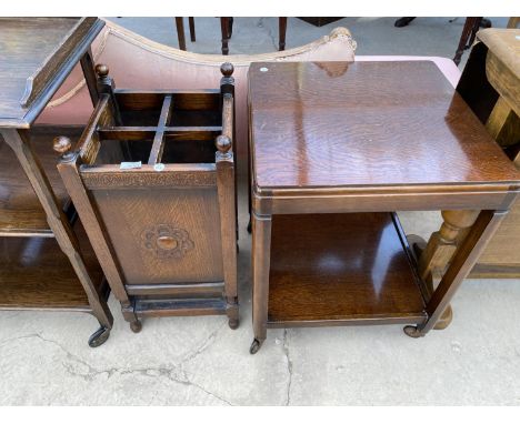 AN OAK STICK STAND AND AN OAK TWO TIER TROLLEY TABLE 