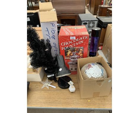 AN ASSORTMENT OF ITEMS TO INCLUDE A DISCO BALL, A BOXED CHOCOLATE FOUNTAIN AND A LAVA LAMP BELIEVED TO BE IN WORKING ORDER BU