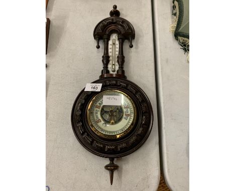 A VINTAGE WOODEN BAROMETER WITH INCORPORATED THERMOMETER 