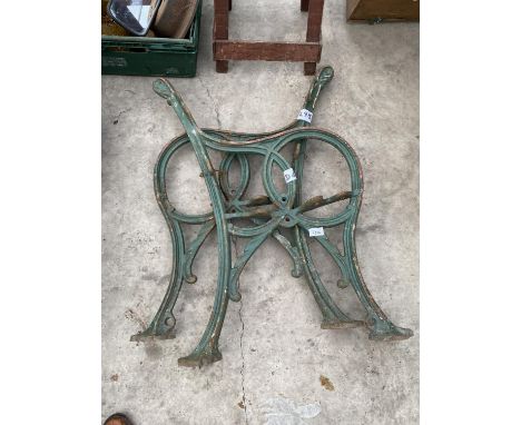 A PAIR OF VINTAGE CAST IRON BENCH ENDS 
