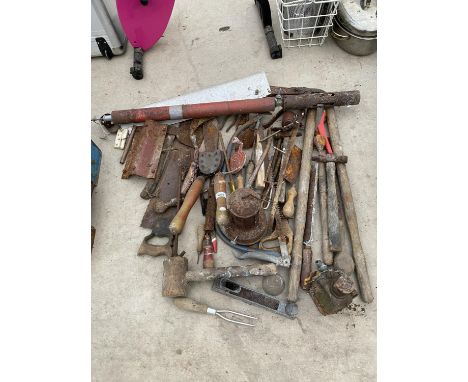 A LARGE COLLECTION OF TOOLS TO INCLUDE SAWS, HAMMERS, OIL CANS ETC. 