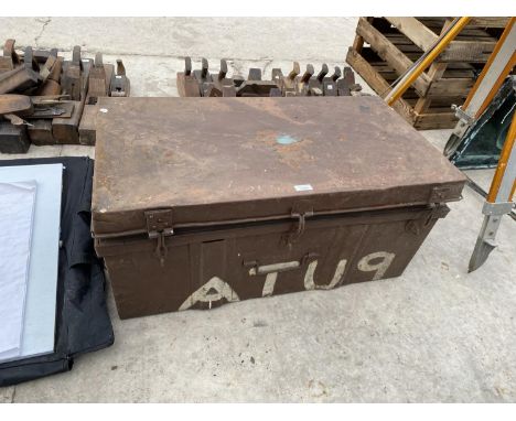 A VINTAGE METAL TRUNK 