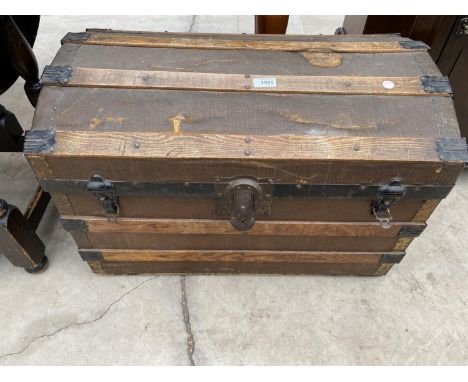 A VICTORIAN TWO HANDLED TRAVELLING TRUNK WITH DOMED TOP, 27" WIDE 