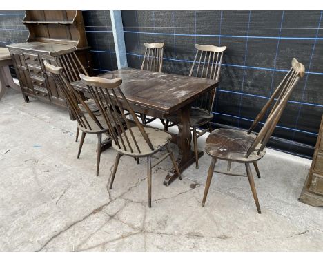 AN OAK DRAW LEAF DINING TABLE AND SIX ERCOL DINING CHAIRS 