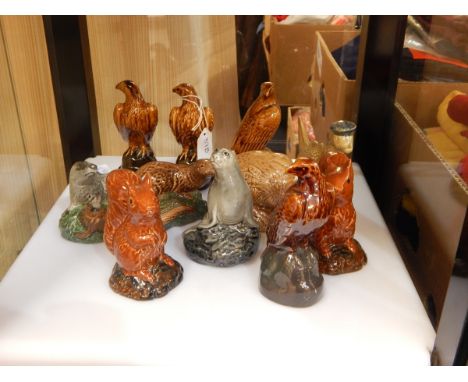 Quantity of Beswick Beneagles Scotch Whisky models to include Loch Ness monster, Haggis, Seal, Badger, Squirrel and Eagles (1